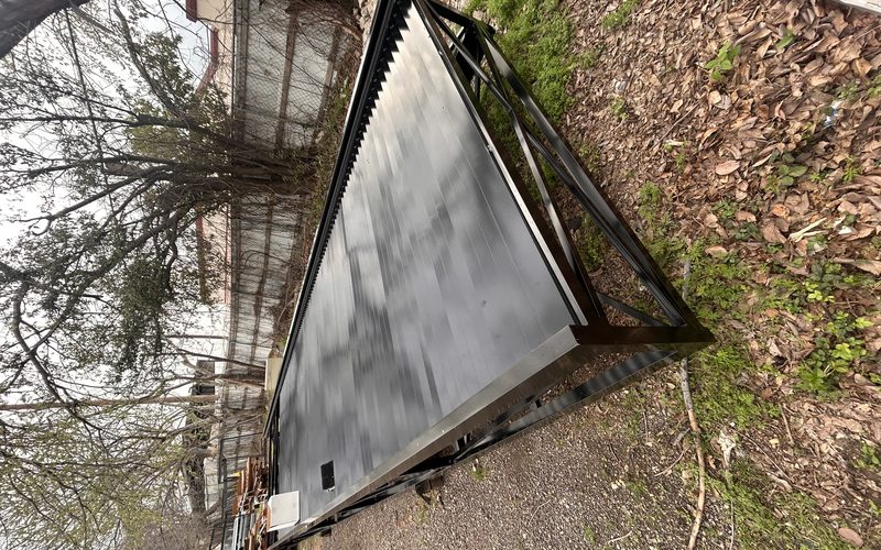 Large fabricated steel louvered security screen